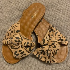 Beach flip flop. Cute bow detail. Comfortable. New, never worn.